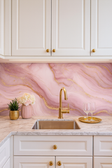 Rose quartz luxe wallpaper from Luxe, featuring a swirling pink and gold marble pattern.
