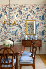 Peacock Pavilion wallpaper with a blue and pink floral design, featuring peacocks and pagodas.