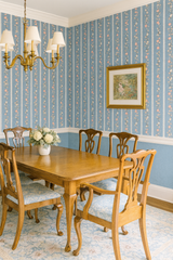 Lace Lane Wallpaper with blue floral and stripe pattern on textured background.