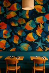 Colorful tropical fish pattern wallpaper, with blue and orange hues, and a starfish motif.
