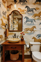 Run Wild wallpaper with horse pattern over the bathroom wall.
