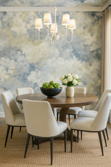 Tempest Haze wallpaper with a cloudy pattern, covering the wall behind a dining set.
