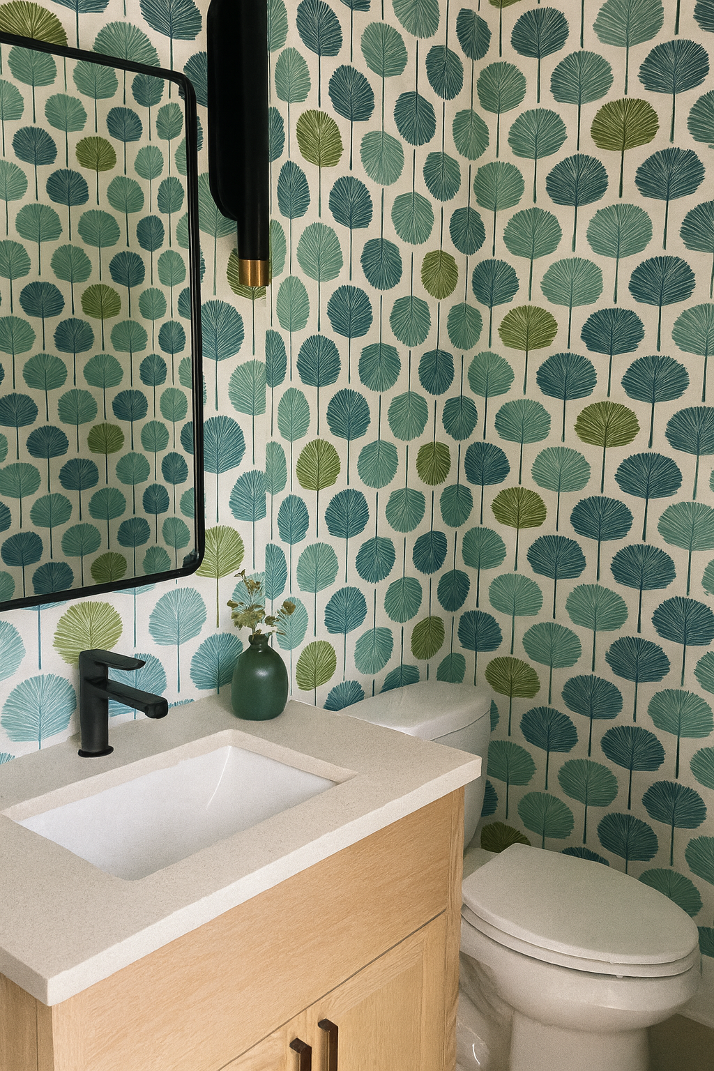 Patterned wallpaper with green and teal foliage print on white background.