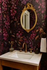 Floral wallpaper with dark purple background and painted floral design.