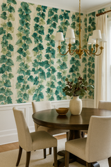 Verdigris vines wallpaper with blue and green leaves, patterned against an off-white background.