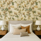 Botanical leaf wallpaper in yellow and green, featuring berry clusters.
