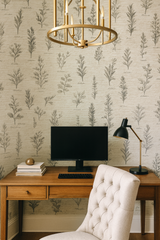 Botanical wallpaper with a scroll design, featuring sketched herbs and handwritten text.
