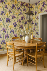 Floral wallpaper with irises pattern on a light yellow background.