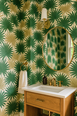 Palm Parade Wallpaper with a green and beige fan palm pattern.
