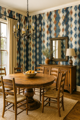 Diamond Drift Wallpaper with harlequin pattern in hues of blue, brown, and cream.
