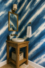 Storm Strokes Wallpaper with blue and white stripes, a textured wall covering.