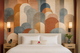 Abstract geometric wallpaper with semi-circular pattern shapes in neutral tones.