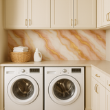 Marble patterned wallpaper in white drift style with pink and gold veining.