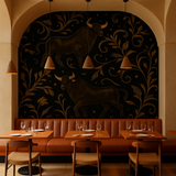Gilded Taurus Wallpaper with bull illustrations and leaf scroll details on black.

