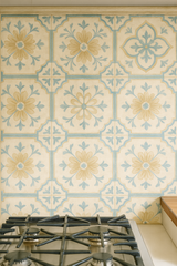 Vintage Provence tile wallpaper featuring a floral pattern in beige and blue.