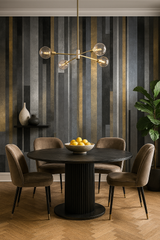 Graphite stripe wallpaper with gray and gold tones, featuring a vertical pattern, and contrasting neutral colored furniture.
