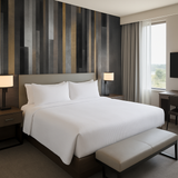 Striped graphite wallpaper featuring grey, black and gold vertical bars.