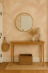 Rosewater Veil wallpaper with floral leaf pattern on a textured wall.