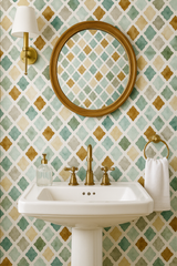 Kasbah Dust Wallpaper with an geometric pattern on a bathroom wall.
