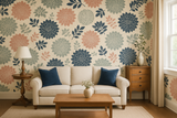 Floral wallpaper with dahlia pattern in pink, blue, and green on beige background.
