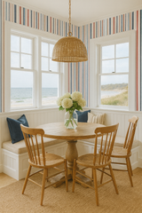 Nantucket Stripe Wallpaper with stripes by Seabrook Wallcoverings, in a traditional style setting, complementing the dining room.