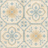 Vintage Provence tile wallpaper with floral designs in cream and blue.

