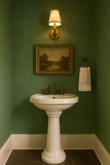 Green pine linen wallpaper with texture, displayed on the bathroom wall behind a sink and landscape painting.
