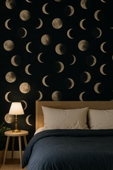 Lunar veil wallpaper with moon phase pattern on a bedroom wall.
