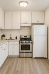 Glazed tile wallpaper with a brick pattern, in a kitchen setting, with cabinets and appliances.