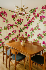 Floral bougainvillea wallpaper with pink flowers and green leaves, patterned on a beige textured background.

