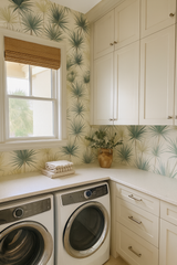 Patterned wallpaper with green yucca mirage design on cream background.