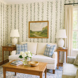 Olive stripe wallpaper with leaf design, in a traditional style.
