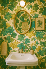 Canopy Overlook wallpaper with green and yellow leaf pattern, botanical print.
