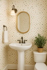 Confetti Garden Wallpaper with green and peach dots on off-white, decorative bathroom wallpaper.
