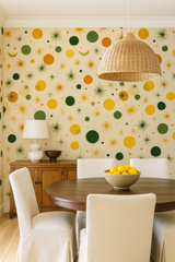 Atomic Yucca Wallpaper with yellow, orange, and green atomic stars and circles pattern.
