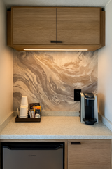 Mineral drift wallpaper featuring swirling patterns, resembling natural stone.