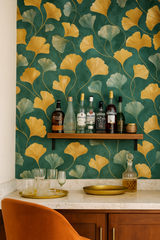 Gilded ginkgo wallpaper with yellow leaves on a green textured background.
