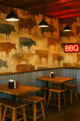 Cattle-patterned Dairy Dreams Wallpaper featuring brown and tan animal silhouettes on a beige textured background.
