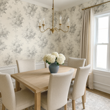 Sepia Bloom Wallpaper with floral pattern, decorating the walls of a dining room with table and chairs.