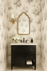 Sepia floral wallpaper with a grey rose pattern, covering the walls of a small bathroom.
