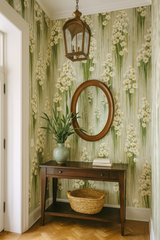 Floral patterned wallpaper from Brewster Wallcovering with a green drizzle effect.
