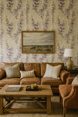 Floral print wallpaper with lavender and white blossoms, covering the wall.
