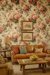 Floral Blush Bloom Ballet wallpaper with pink and green hues, displayed on a wall, providing a vintage-inspired aesthetic.
