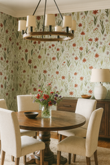 Botanical wallpaper with red and green floral pattern, covering dining room walls.
