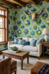 Hydrangea Rhapsody Wallpaper with blue and green floral pattern, shown with a decorative skull mount.
