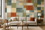 Patchwork wallpaper with squares of teal, beige, green, and rust, with a subtle linen texture.