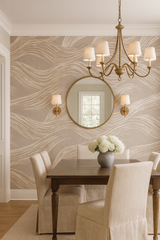 Tan wallpaper with wave pattern, covering the wall behind a dining room set.