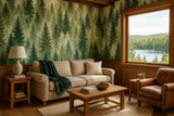 Green forest pattern wallpaper with evergreen trees, Pinehollow Wallpaper, in a cabin-style living room interior.
