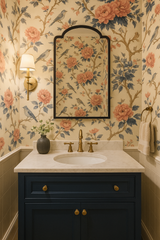 Garden Songbird Wallpaper with peach flowers and blue birds, set on a cream-colored textured background.

