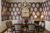 Cameo Crush Wallpaper with silhouette cameo pattern on plum background.
